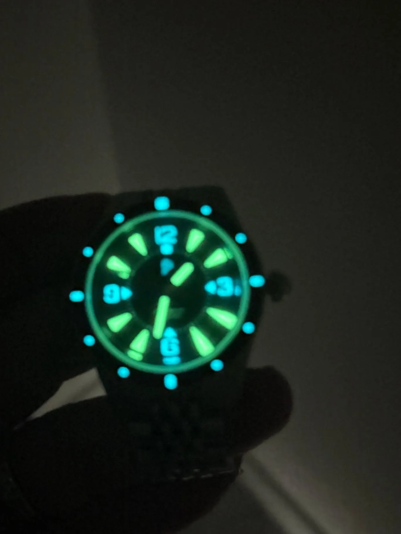 Phorcydes PH-2A full-lume diver glowing in the dark — luminous dial and bezel plots fully charged